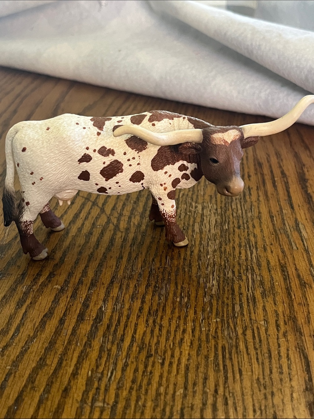 Schleich Brown and White Longhorn cow Figurine